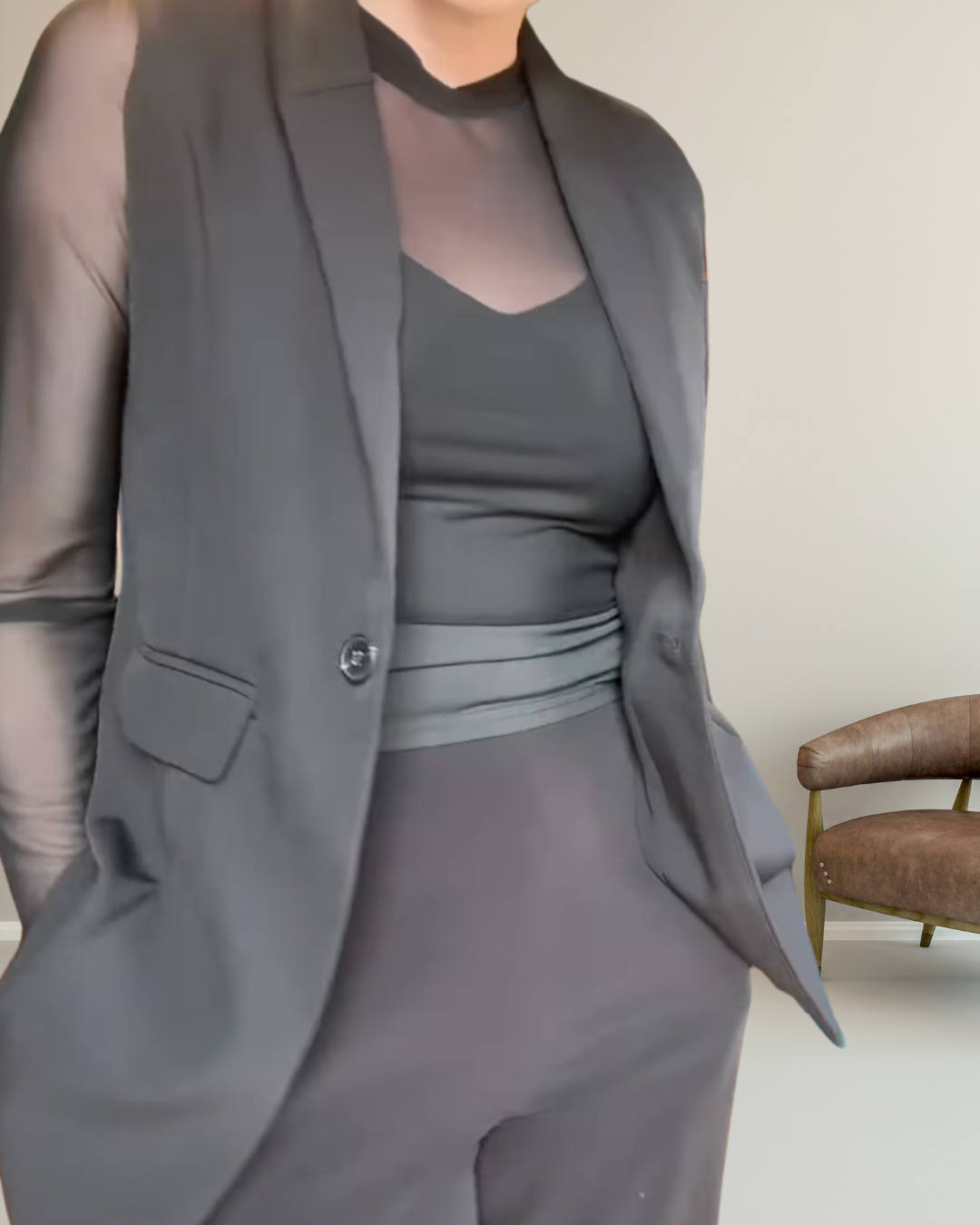 long sleeve sheer mesh top in black with sleeveless blazer vest in concert black