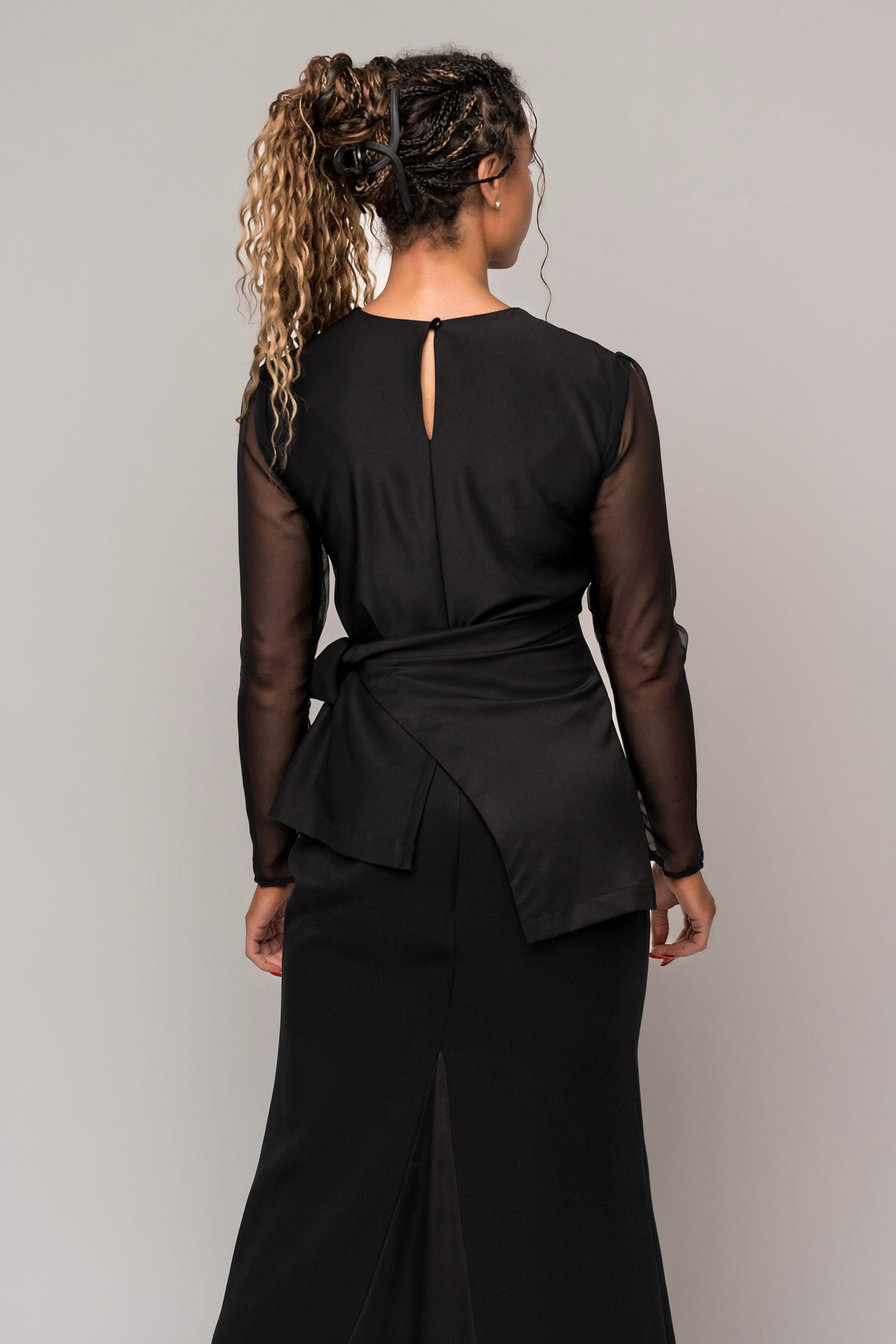 asymmetrical long sleeve black blouse with sheer sleeves