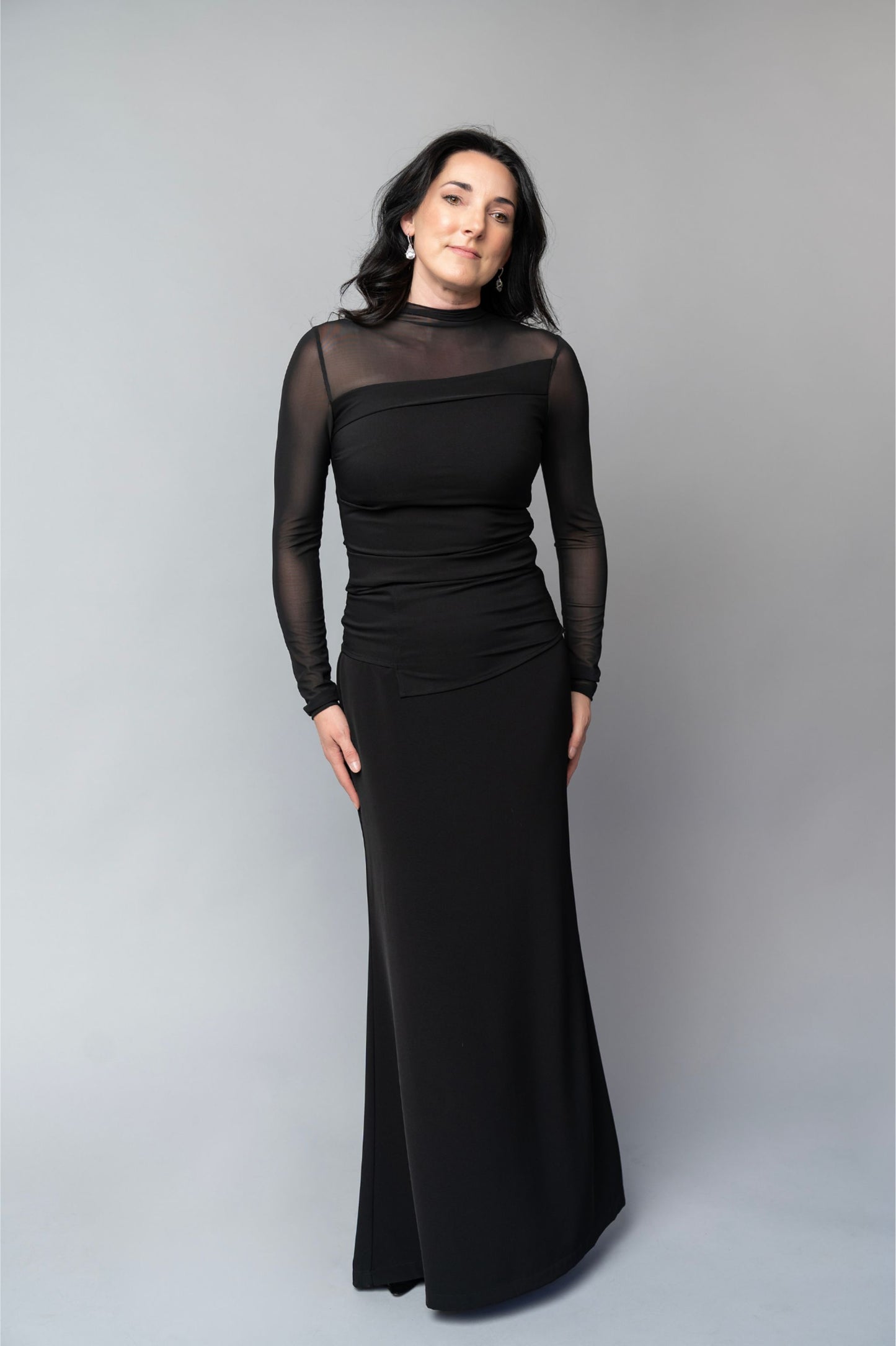 Asymmetrical black long sleeve blouse with sheer sleeves for choir, concert band and orchestra musicians.