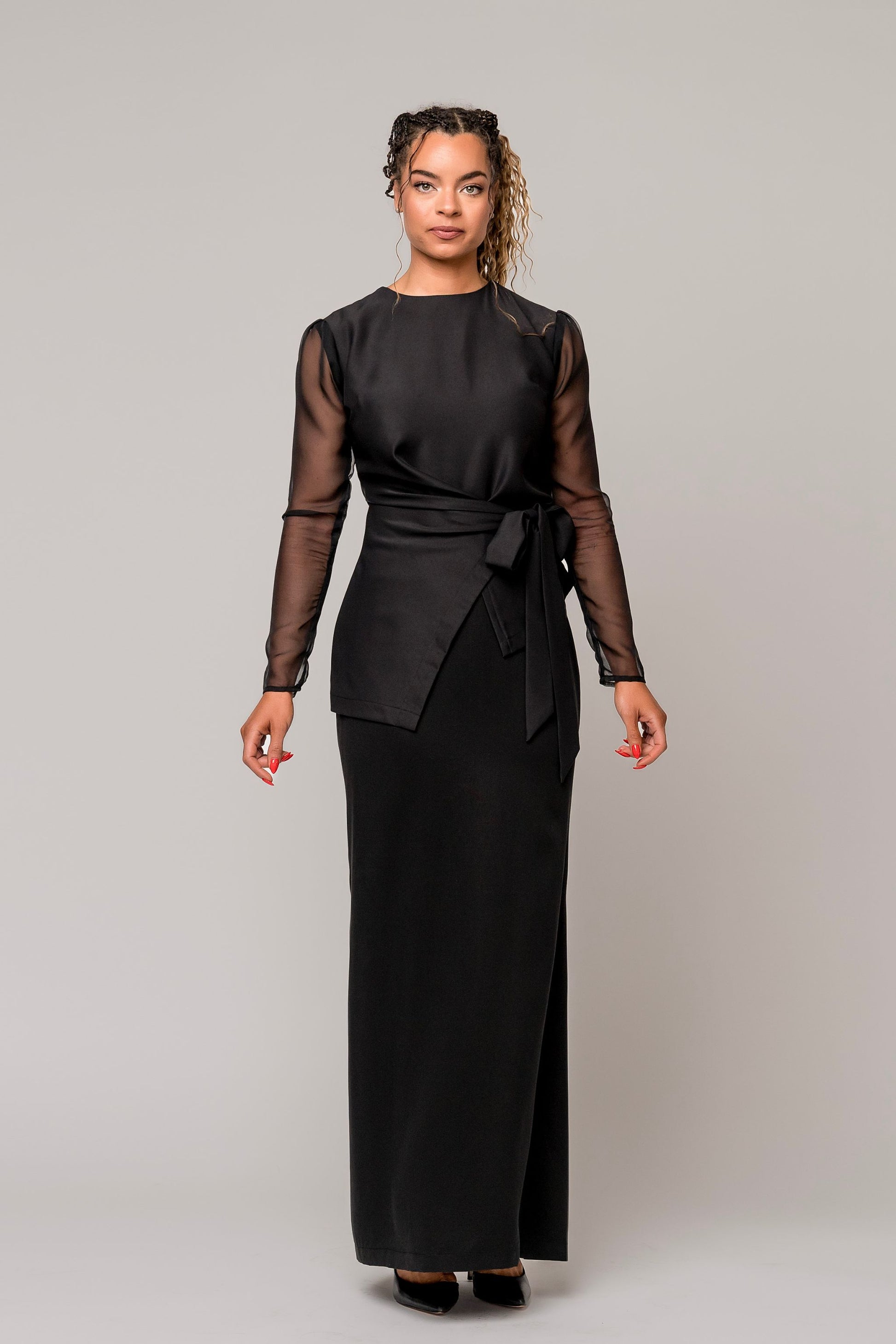 asymmetrical long sleeve black blouse with sheer sleeves