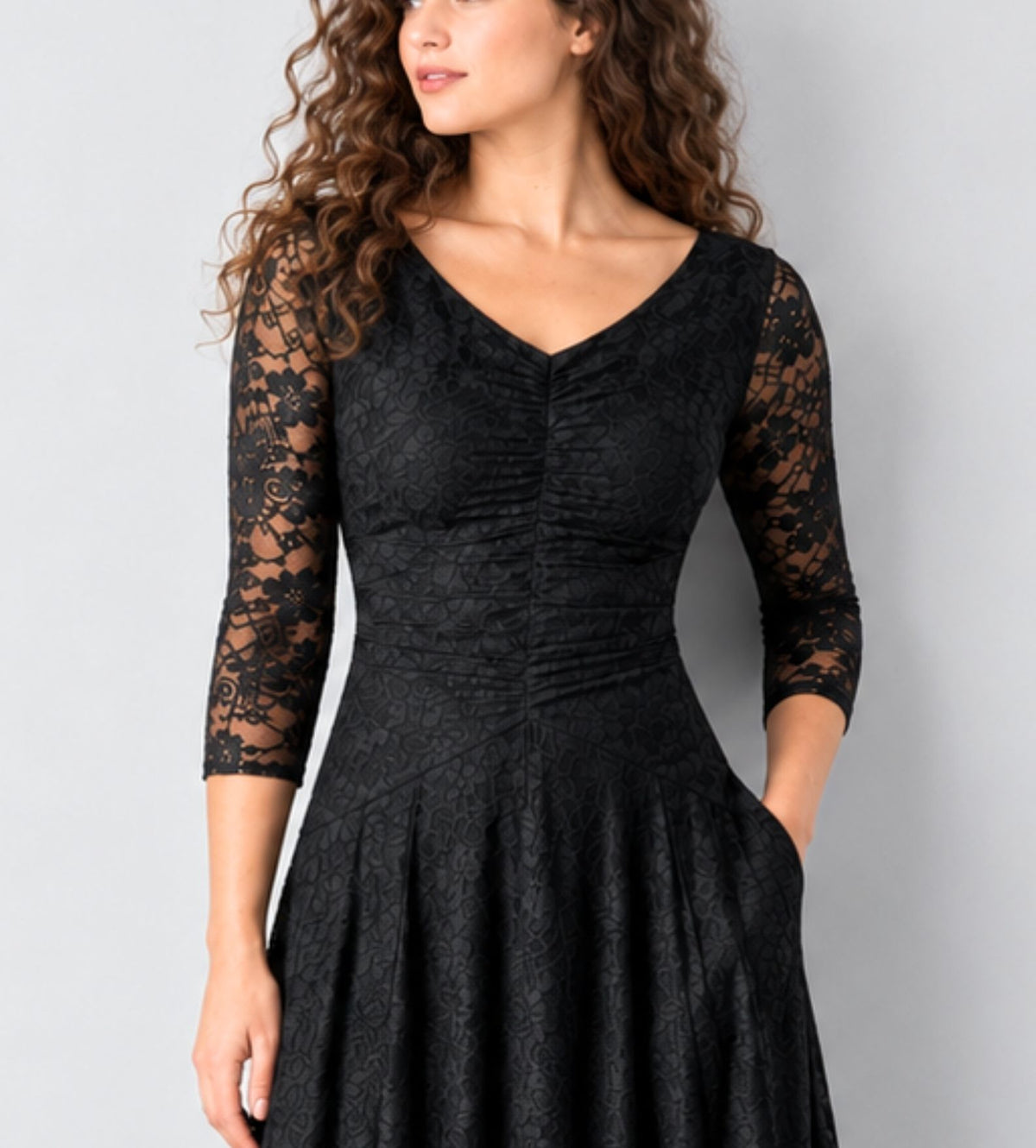 long-sleeve black concert dress with pockets in lace for musicians in choir, band, and orchestra.