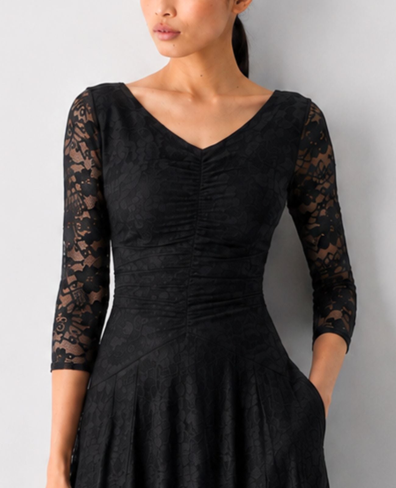 long-sleeve black concert dress with pockets in lace for  musicians in choir, band, and orchestra.
