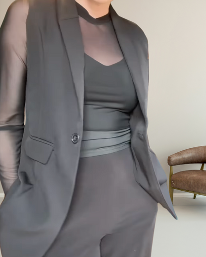long sleeve sheer mesh top in black with sleeveless blazer vest in concert black