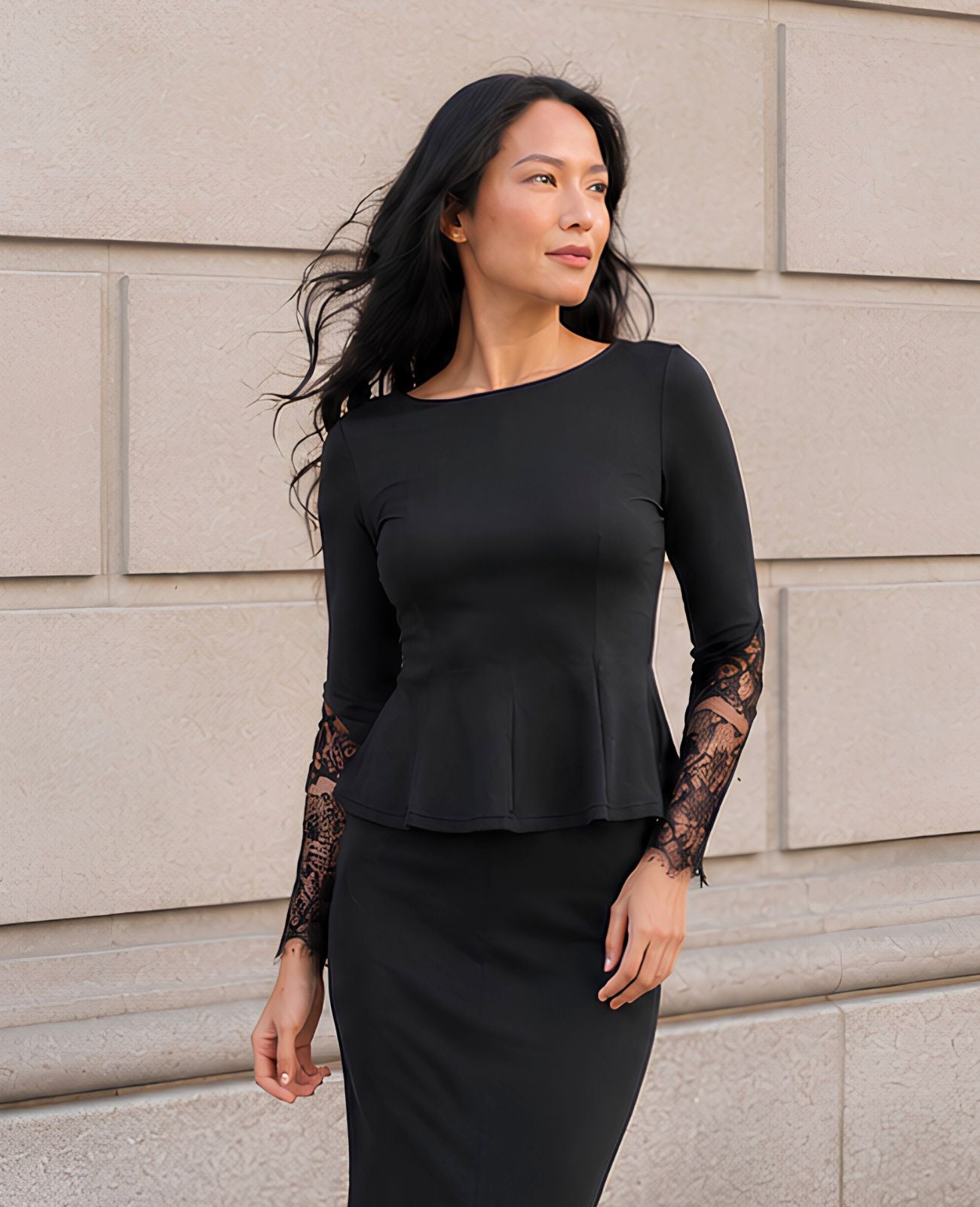 long sleeve peplum top in black