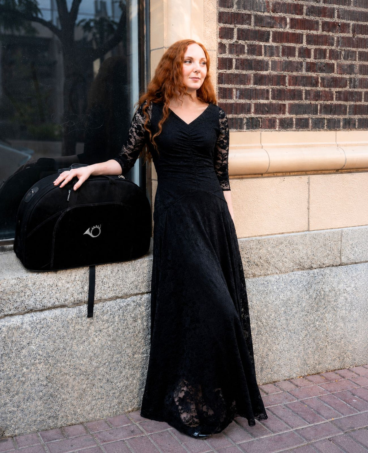 long-sleeve black concert dress with pockets in lace for  musicians in choir, band, and orchestra.