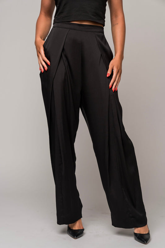gender-neutral concert black pants in satin with deep pockets